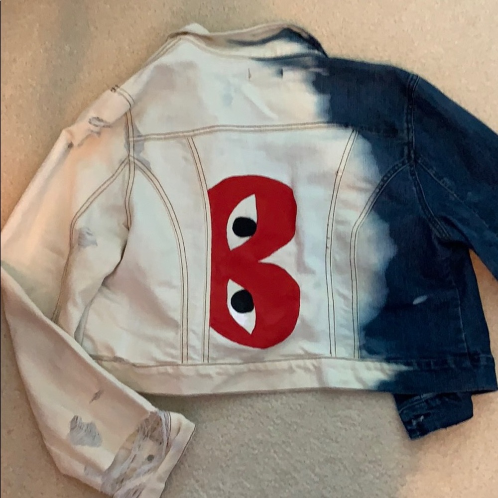 Distressed denim jacket